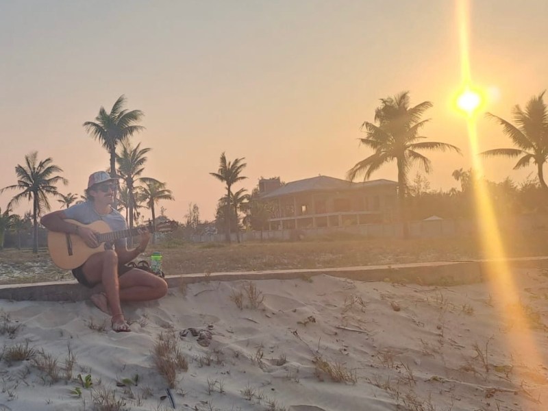Riding to the Da Nang Peninsula and playing guitar as the sun&nbsp;sets